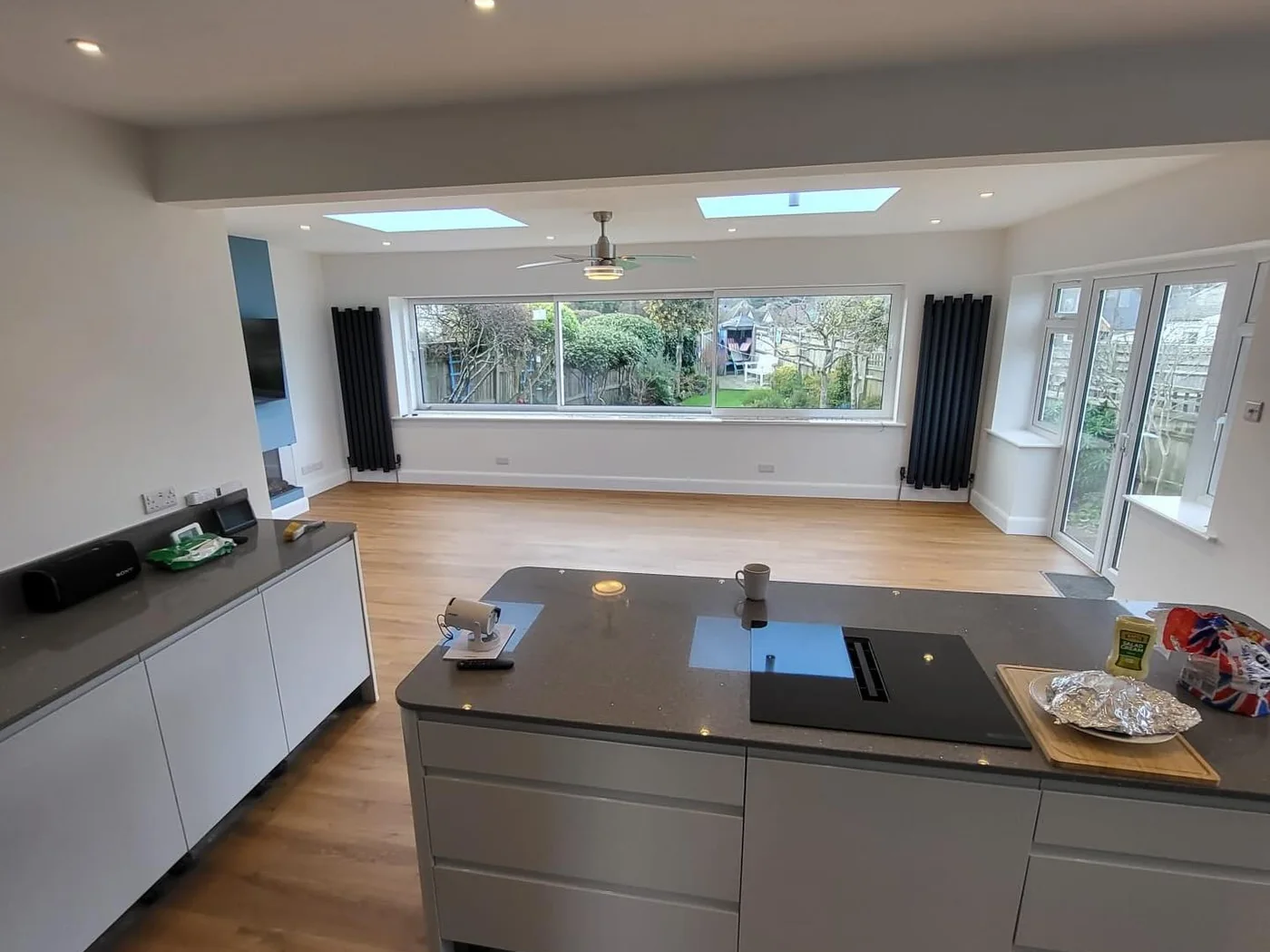 Kitchen island, Eastbourne. The same floor run under and around the island, no thresholds